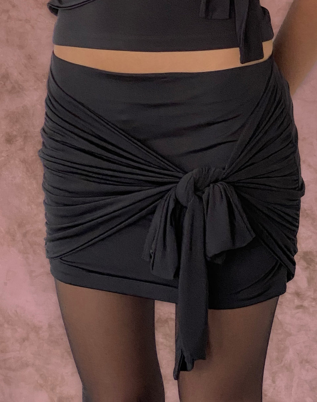 Minifalda Kass con detalle de lazo en Slinky Negro