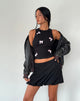 Imagen de Rave Vest Top en negro con lazos rosas