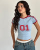 Image of Salda Tee in Nantucket Blue with Adrenaline Red Binding