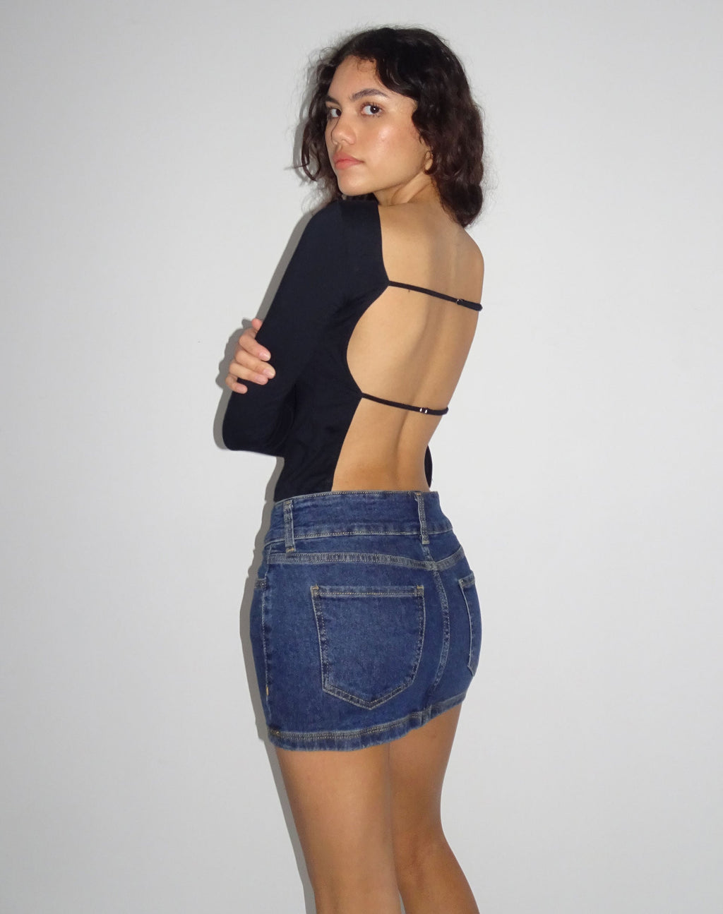Mini-jupe en jean taille basse, délavé vintage foncé