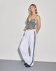 Image of Coze Wide Leg Jogger in White with Navy Double Stripe (Jogging à jambes larges en blanc avec double rayure en bleu marine)