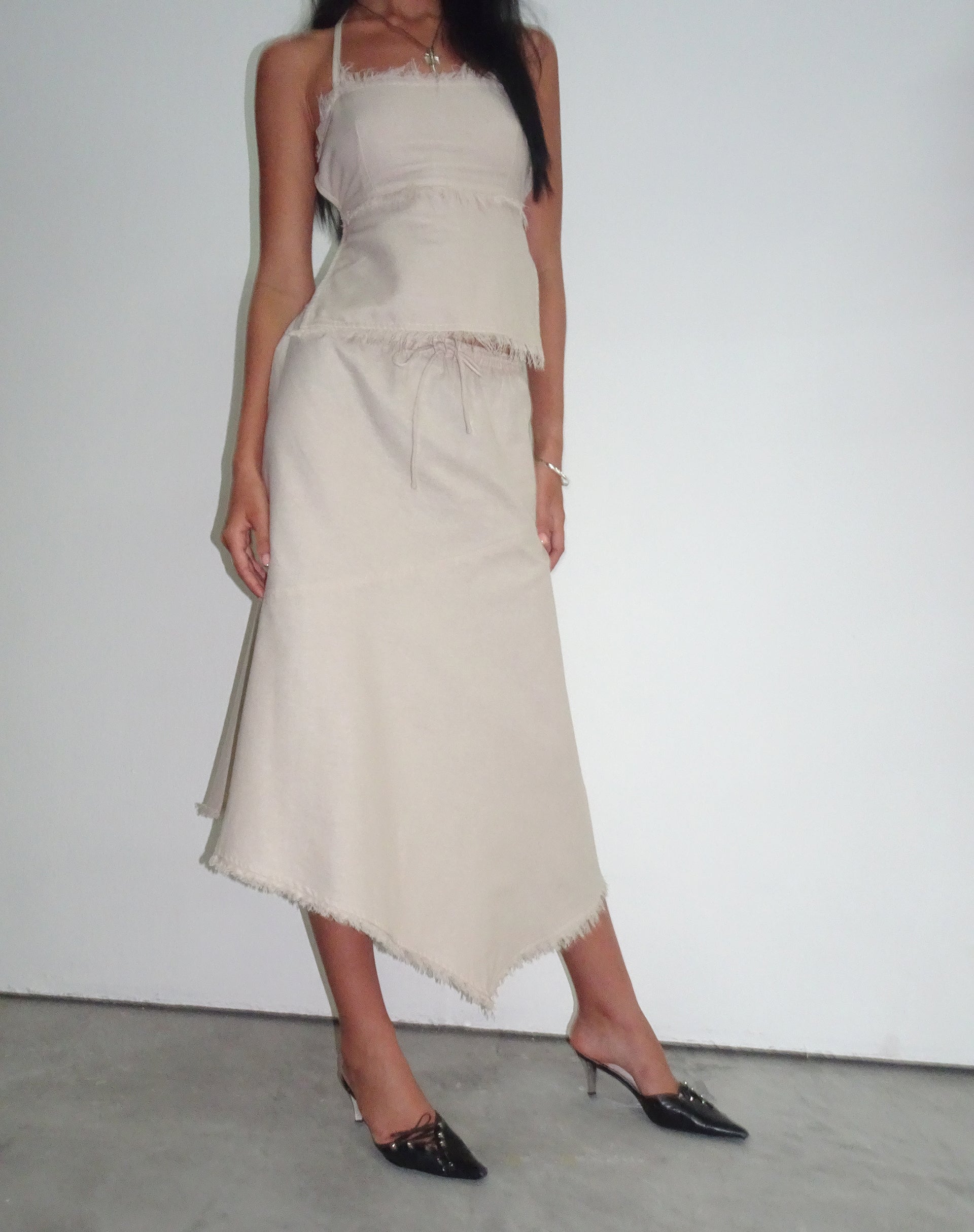 Image of Yvaine Asymmetric Midi Skirt in Ecru