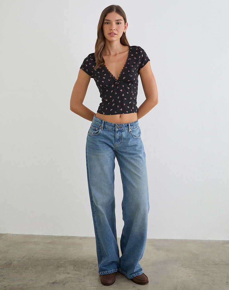 Top Asana en negro con estampado de rosas rojas