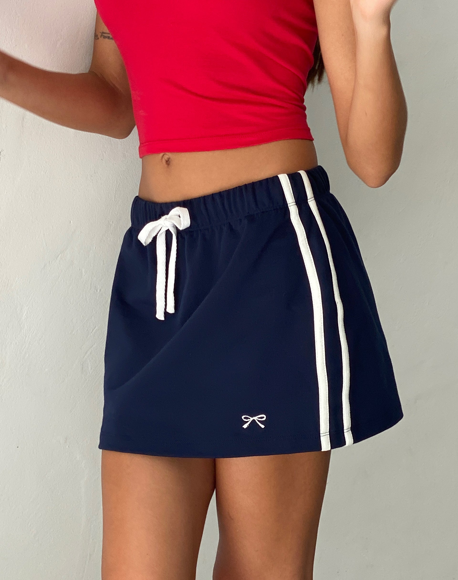 Image of Dheca Mini Skirt in Navy with White Side Stripe