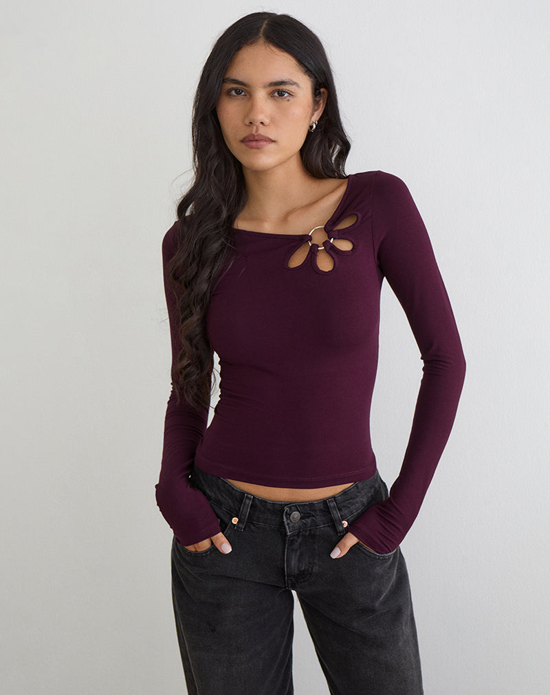 Top de manga larga Donela con anillo floral en color rojo madera