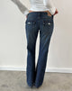 Image of Extra Low Rise Twisted Seam Jeans in Mid Blue Tint
