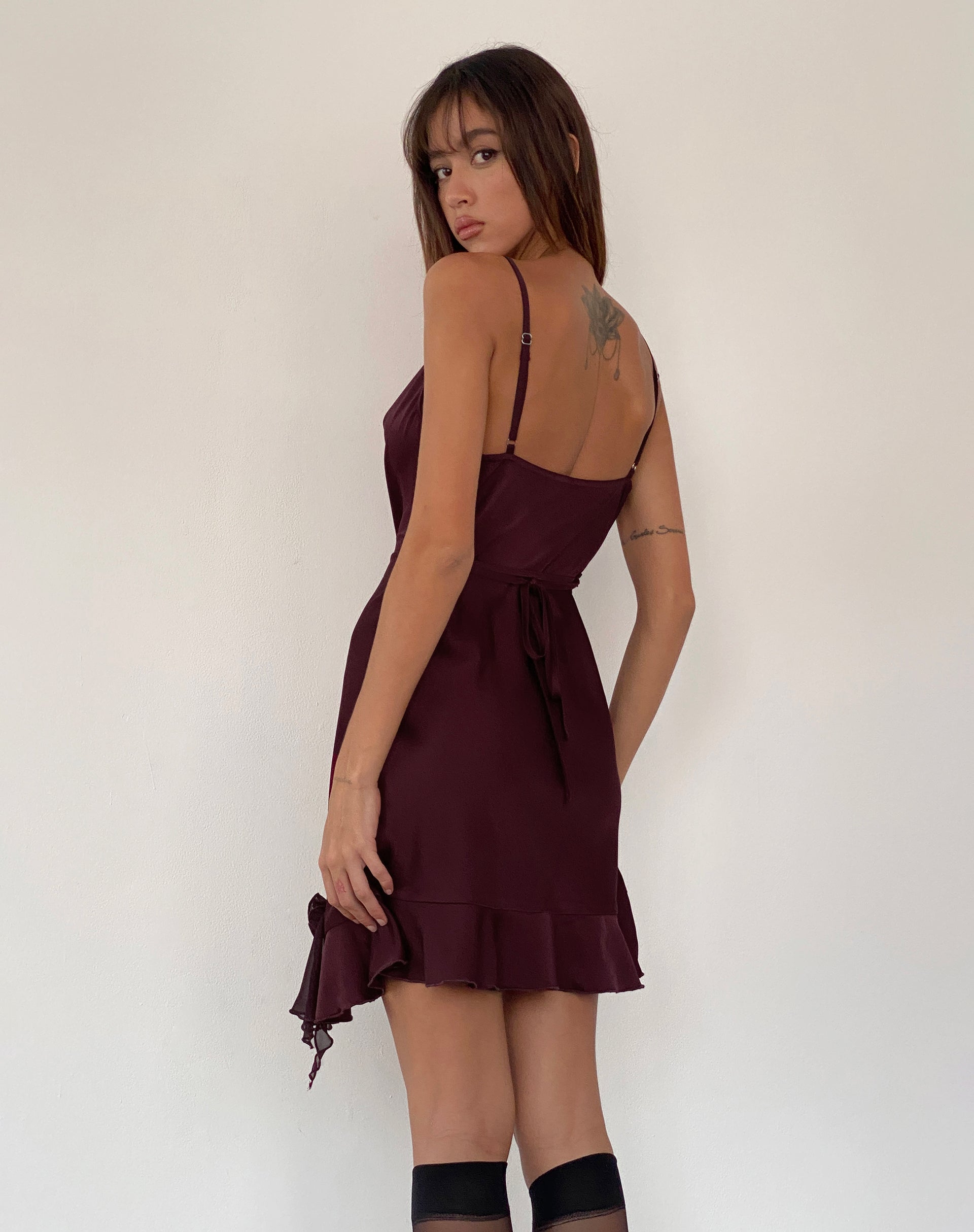 Litera Ruffle Mini Dress in Deep Plum with Rosette