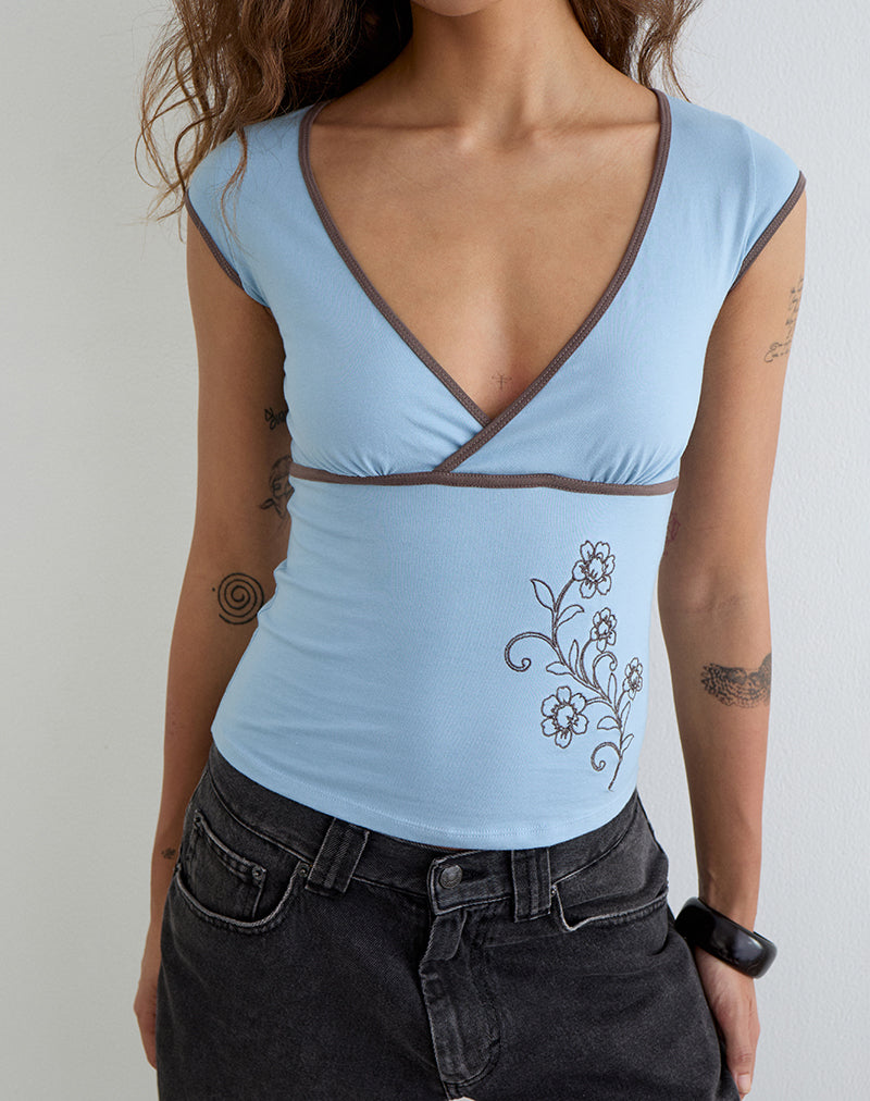 Image of Liuvia Top in Nantucket Blue with Coffee Quartz Binding and Flower Embroidery
