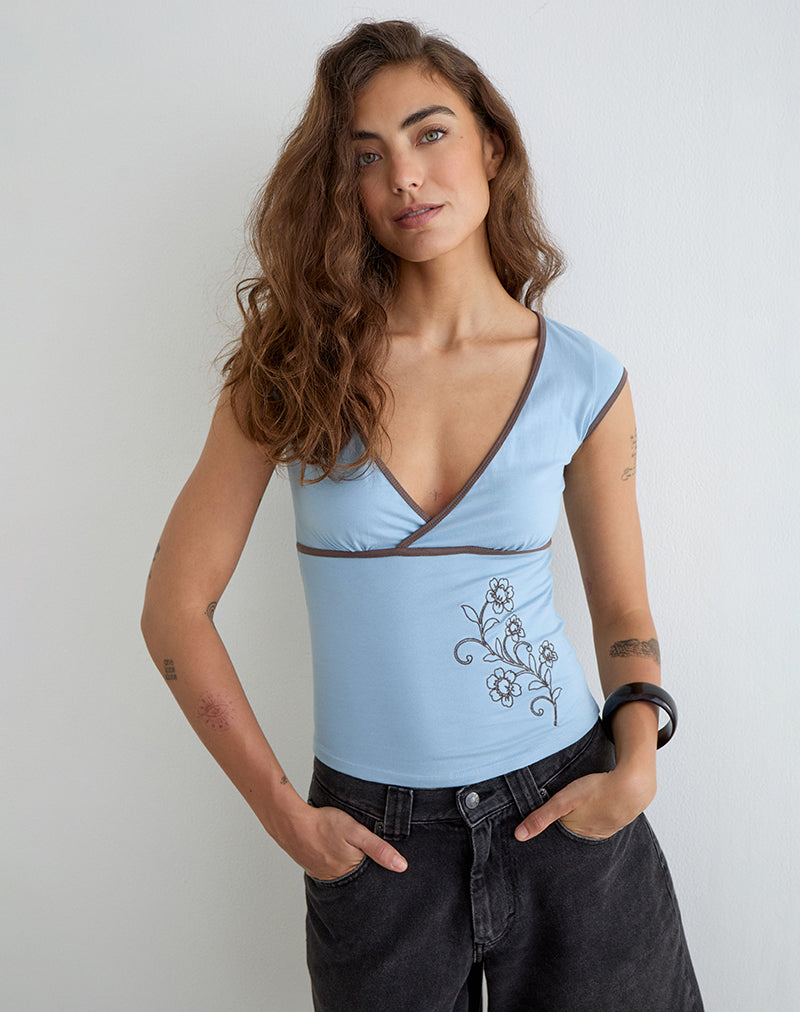 Image of Liuvia Top in Nantucket Blue with Coffee Quartz Binding and Flower Embroidery