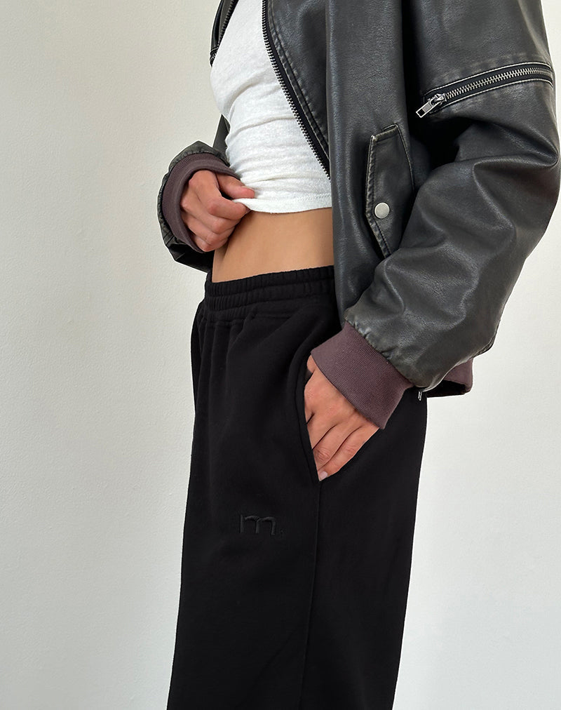 Pantalon de jogging ample noir avec broderie « M »