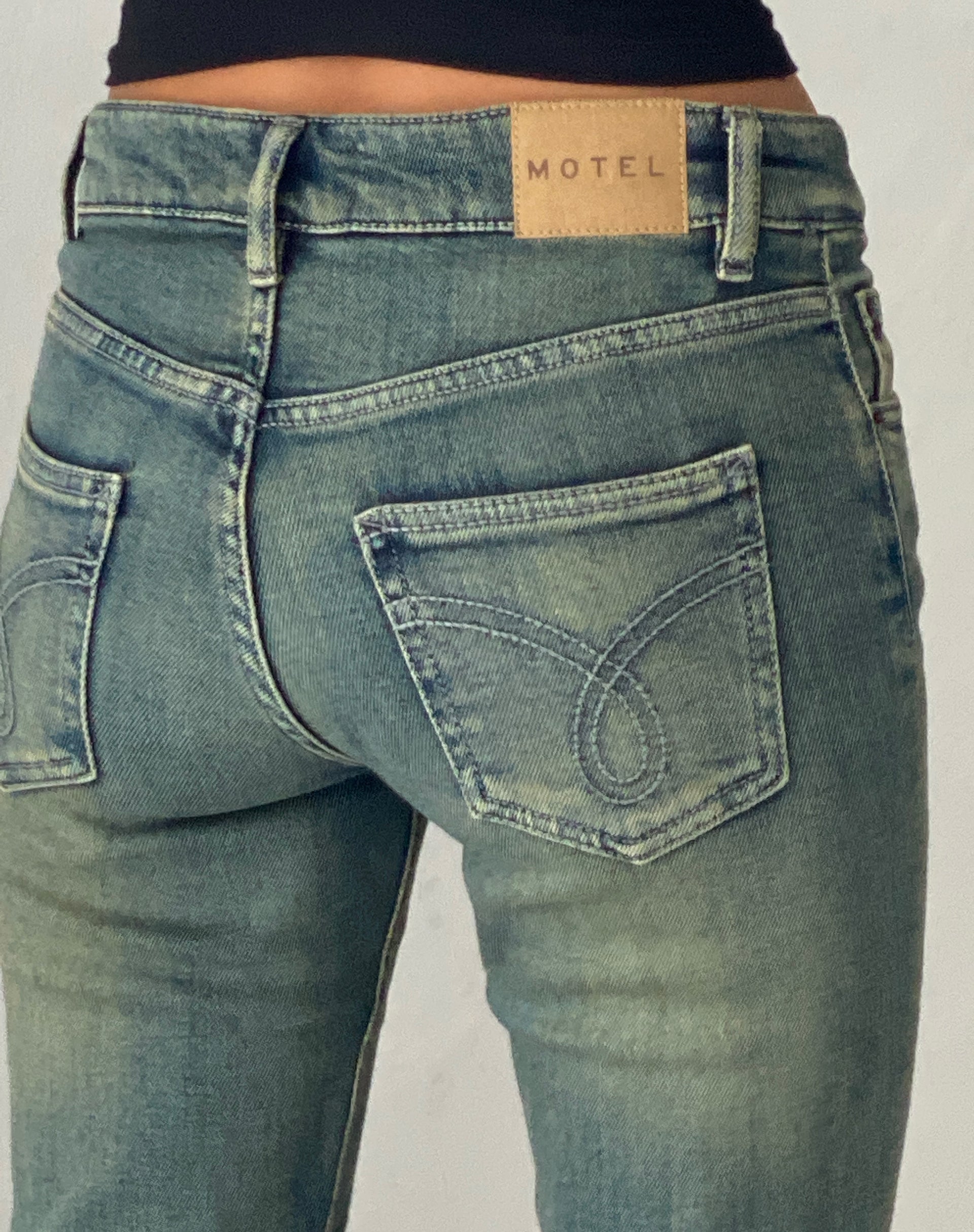 Image of Low Rise Flared Jeans in Green Wash