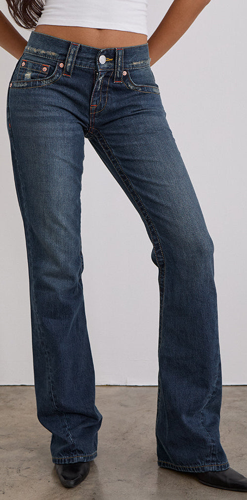 Image of Low Rise Twisted Seam Jeans In Mid Blue Tint