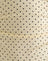 Crema con stampa micropolka nera