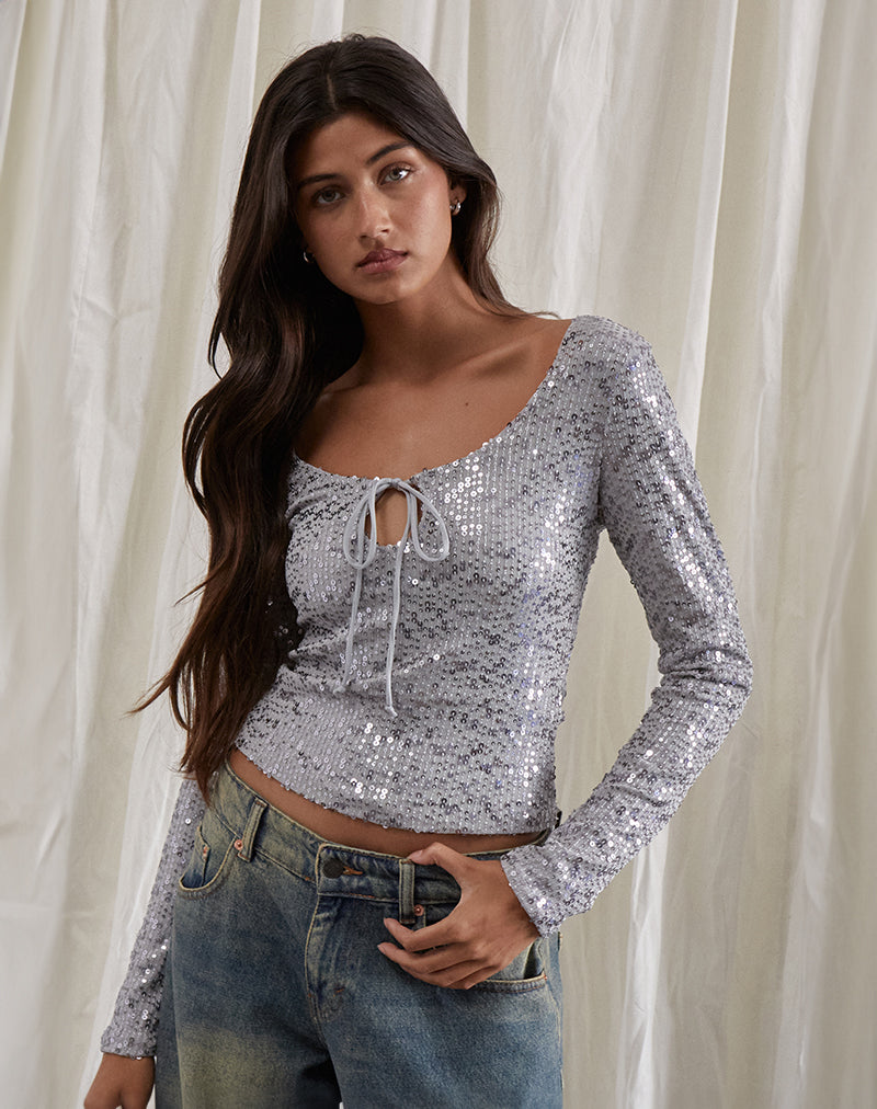 Top Meraga con lacci e paillettes argento