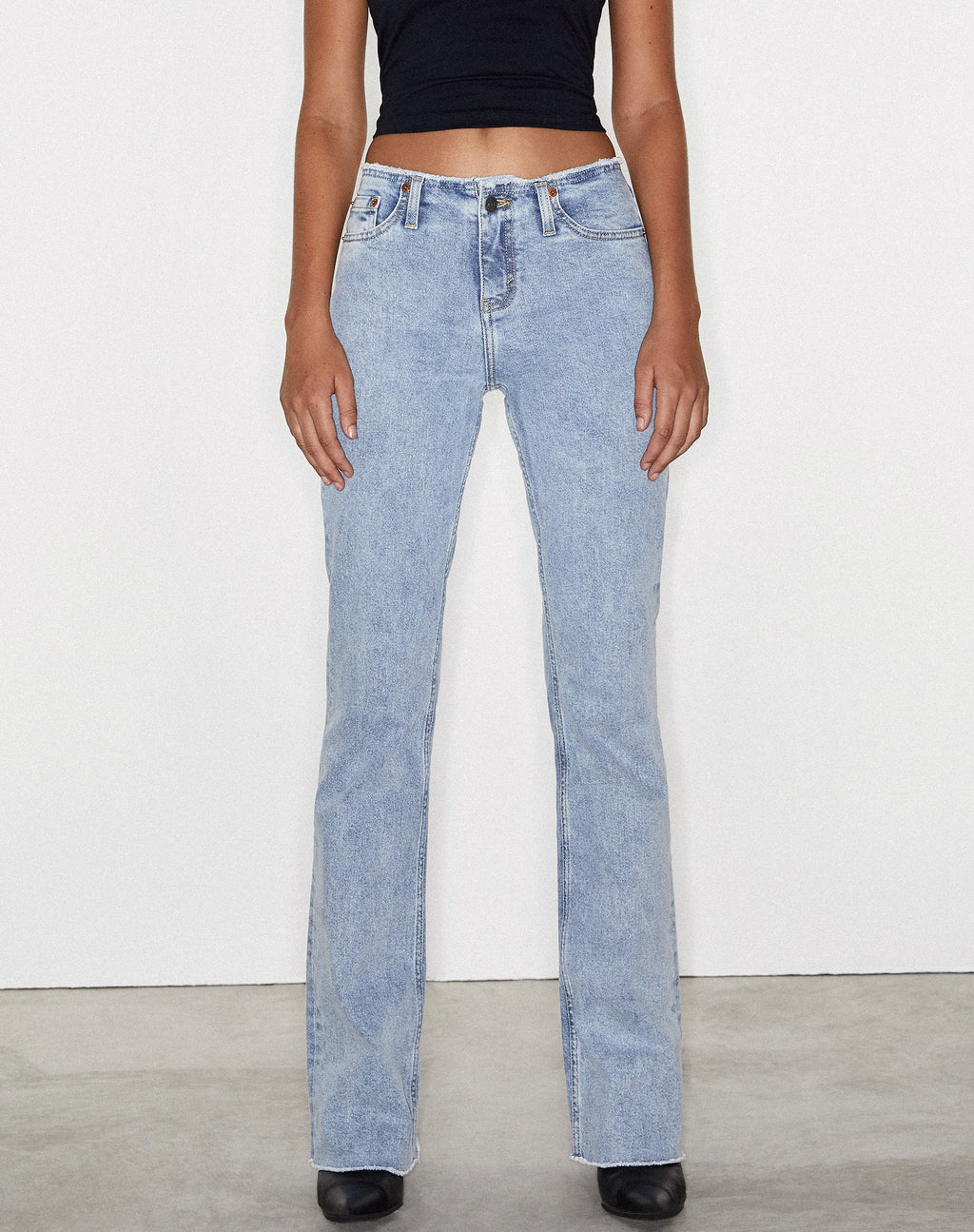 Frayed Low Rise Jeans in Light Wash Blue
