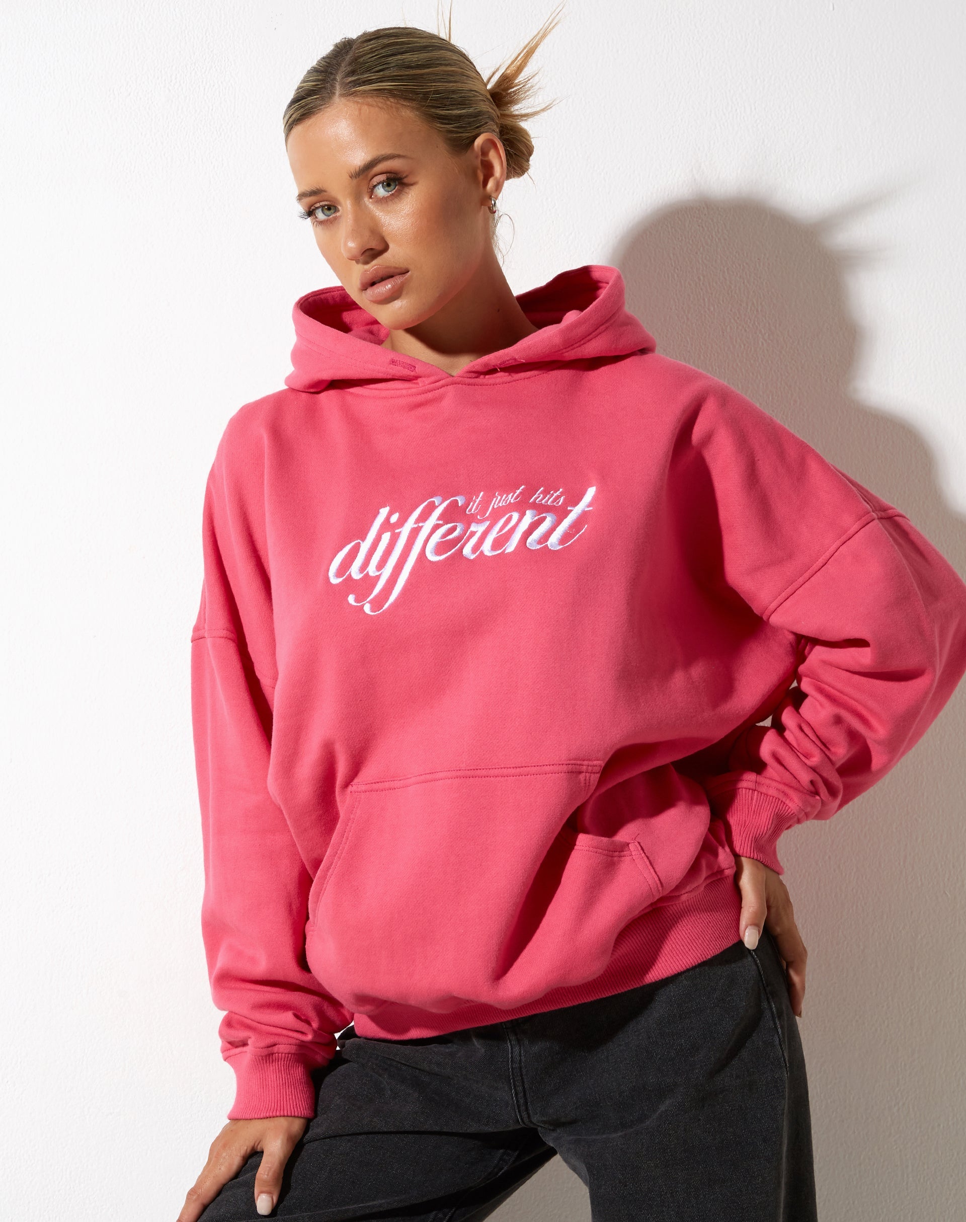 image of Oversize Hoodie in Fandango Pink with "Different' Embro