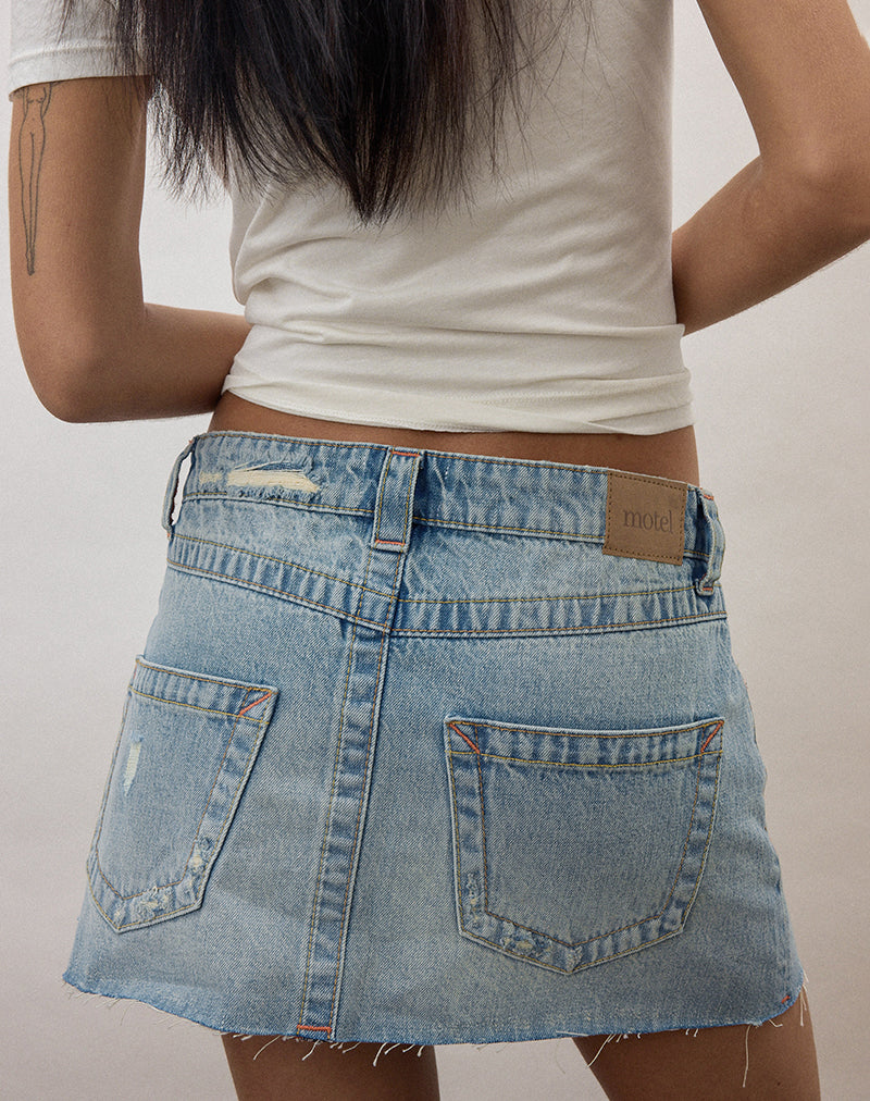 Image of Ripped Raw Hem Denim Mini Skirt in True Blue