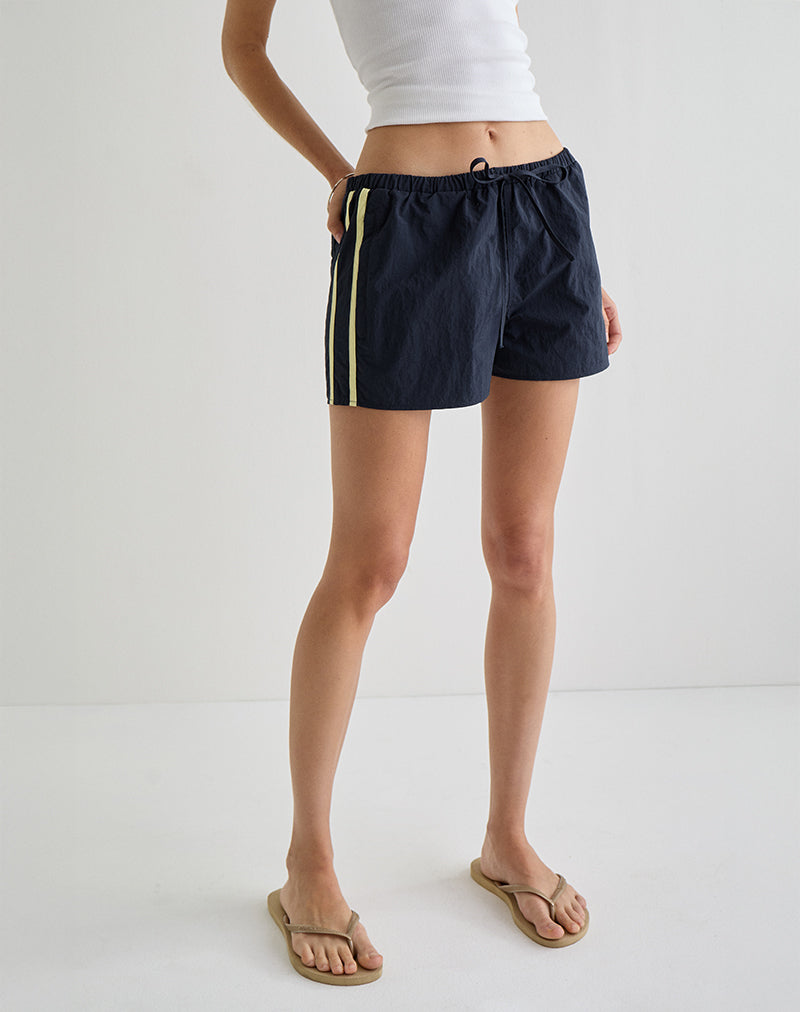 Image of Riu Runner Short in Navy with Yellow Stripe
