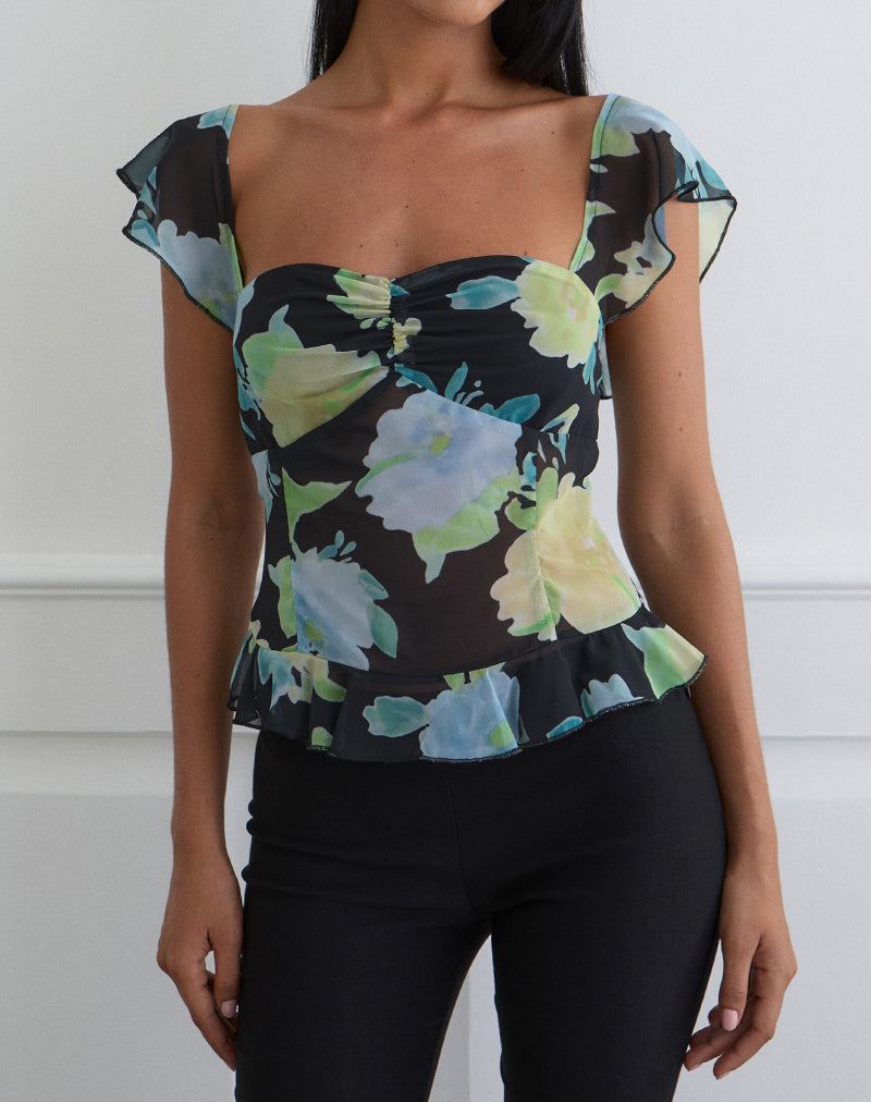 Top Selita en gasa negra con estampado de flores de cristal