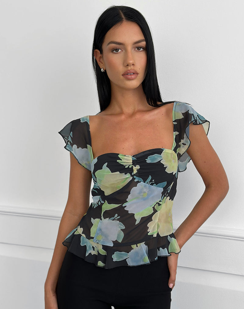 Top Selita en gasa negra con estampado de flores de cristal
