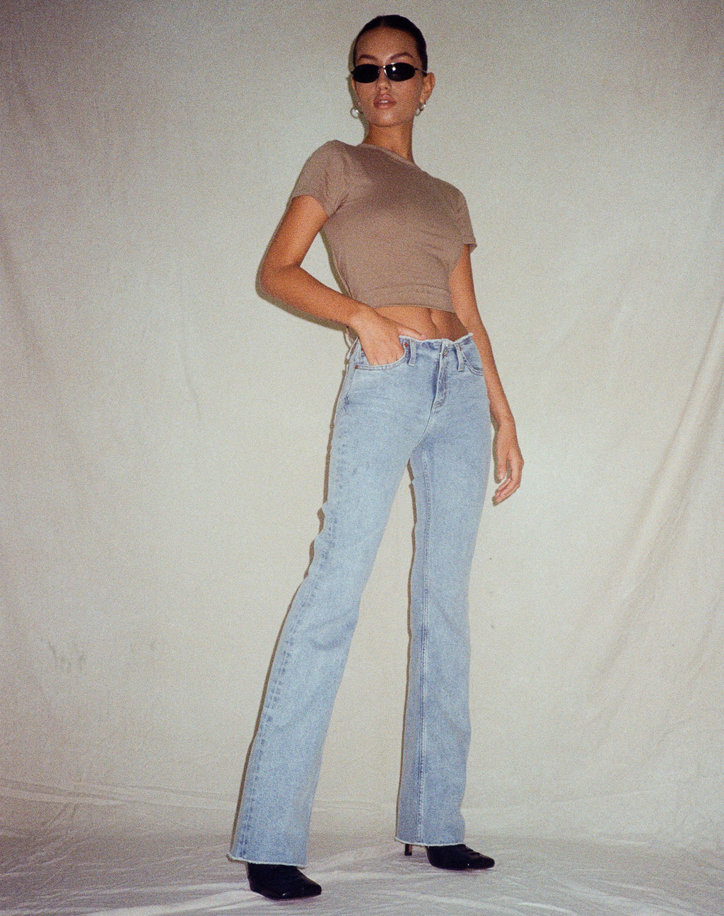 Frayed Low Rise Jeans in Light Wash Blue