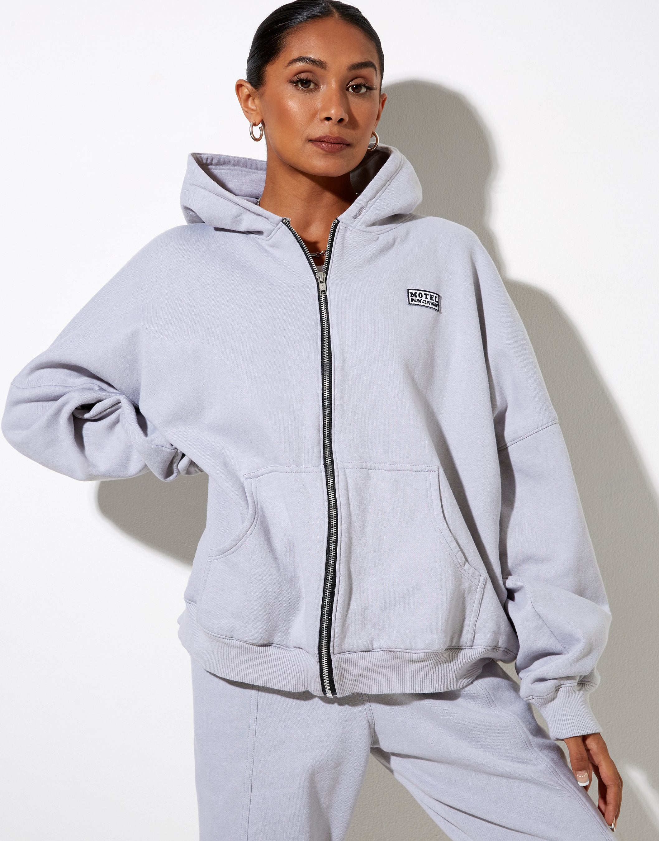 Image of Hollack Hoodie in Lunar Rock with Motel Work Clothing Label Embro